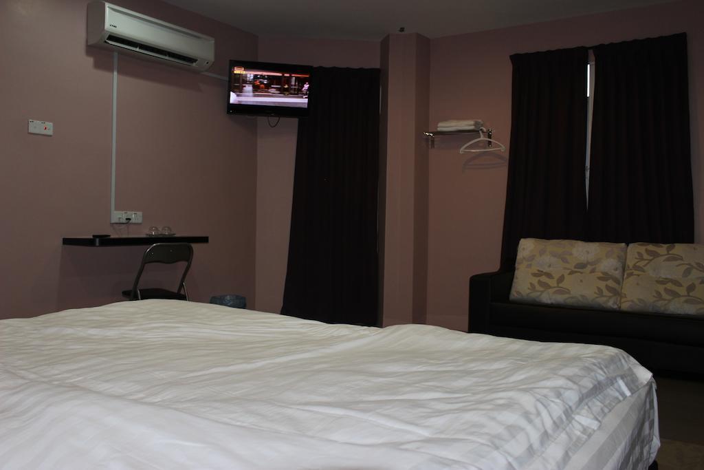 Inn Hotel Teluk Intan Habitación foto